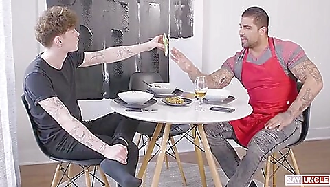 Tattooed girl gets her mouth fucked in a hardcore scene