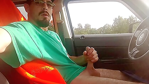 Brunette in a beautiful car with natural tits and ass