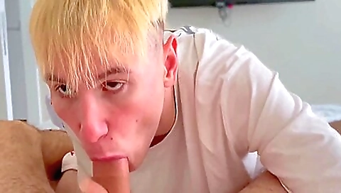 A horny teen in a sexy black tank top fucks in the studio