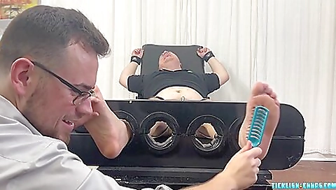 Busty brunette with a nice ass sucks a big dildo in her ass